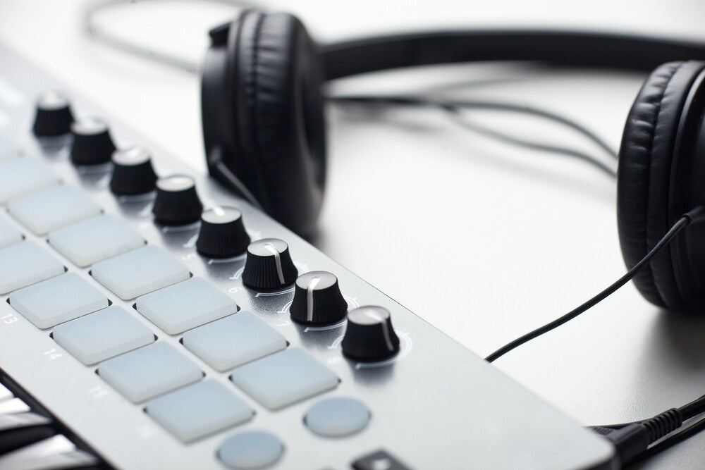 Headphones as part of a music production kit